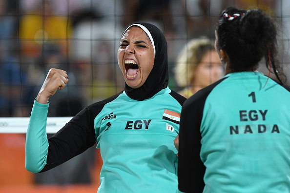 RIO DE JANEIRO, BRAZIL - AUGUST 07: Doaa Elghobashy of Egypt reacts during the Women's Beach Volleyball preliminary round Pool D match against Laura Ludwig and Kira Walkenhorst of Germany on Day 2 of the Rio 2016 Olympic Games at the Beach Volleyball Arena on August 7, 2016 in Rio de Janeiro, Brazil. (Photo by Shaun Botterill/Getty Images)